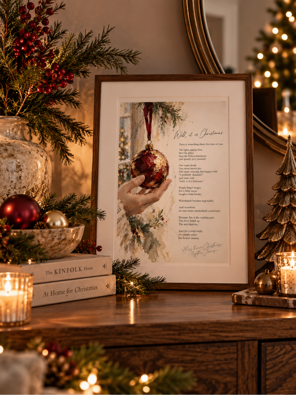 Well, It Is Christmas framed literary art print displayed on a mantelpiece in a cosy Christmas interior with festive decorations and warm lights.